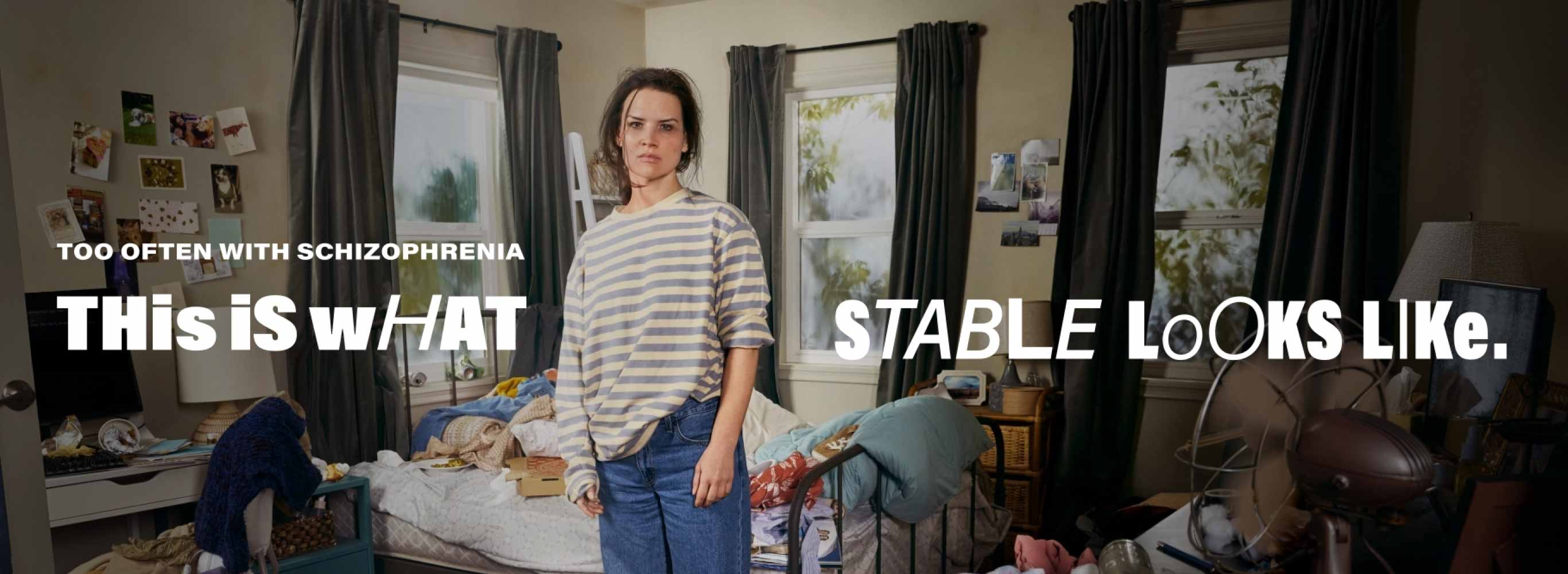 woman standing in messy room