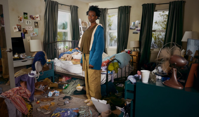 woman standing in her room
